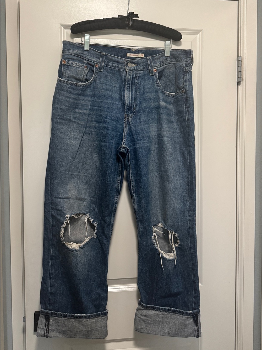 Levi's Blue Distressed Relaxed Jeans with Knee Rips